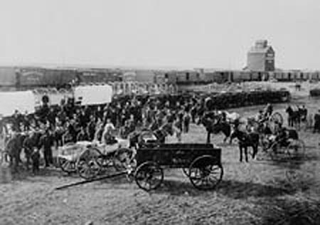 The Barr colonists at their prairie camp near Lloydminster, Saskatchewan, 1903, showing rows of tents and settlers on the open plain