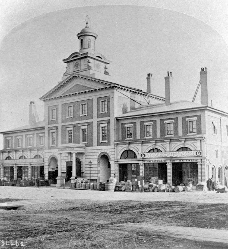 Photograph of Toronto's second city hall, the 1845 New Market House building, in 1868
